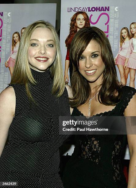 Actress Amanda Seyfried and actress Lacey Chabert attend a private screening of "Mean Girls" on April 23, 2004 at Loews Lincoln Square Theater, in...