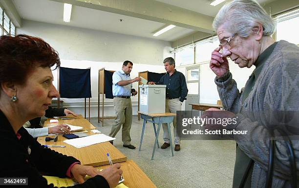 Cypriots vote in a referendum on April 24, 2004 in Nicosia, Cyprus. Greek and Turkish Cypriots are voting in twin referendums on whether to reunite...