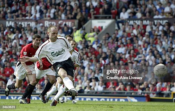Danny Murphy of Liverpool scores the first goal with a penalty during the FA Barclaycard Premiership match between Manchester United and Liverpool at...