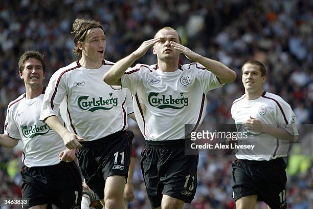 Danny Murphy of Liverpool celebrates after scoring the first goal with a penalty during the FA Barclaycard Premiership match between Manchester...
