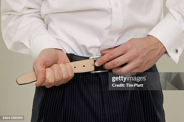 Adjusting 659 Adjusting Belt Stock Photos, High-Res Pictures, and Images - Getty ...