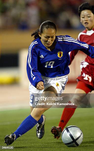 Forward Karina Maruyama of the Japanese national women's soccer team, maneuvers with the ball at the AFC Olympics qualifying tournament semi-final...