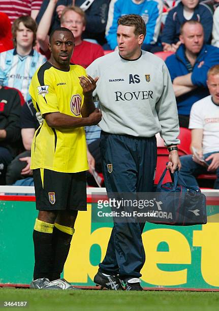 Aston Villa striker Darius Vassell is taken off injured during the FA Barclaycard Premiership match between Middlesbrough and Aston Villa at The...