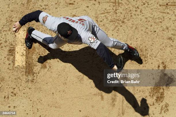 Roger Clemens of the Houston Astros warms up in the bullpen before a game against the Colorado Rockies at Coors Field on April 24, 2004 in Denver,...