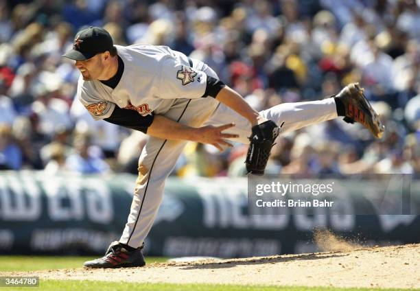 Roger Clemens of the Houston Astros delivers a pitch against the Colorado Rockies in the sixth inning on April 24, 2004 at Coors Field in Denver,...