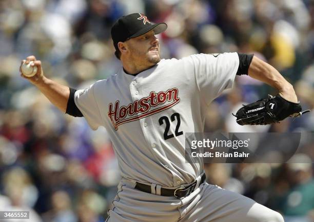 Roger Clemens of the Houston Astros delivers a pitch against the Colorado Rockies in the first inning on April 24, 2004 at Coors Field in Denver,...