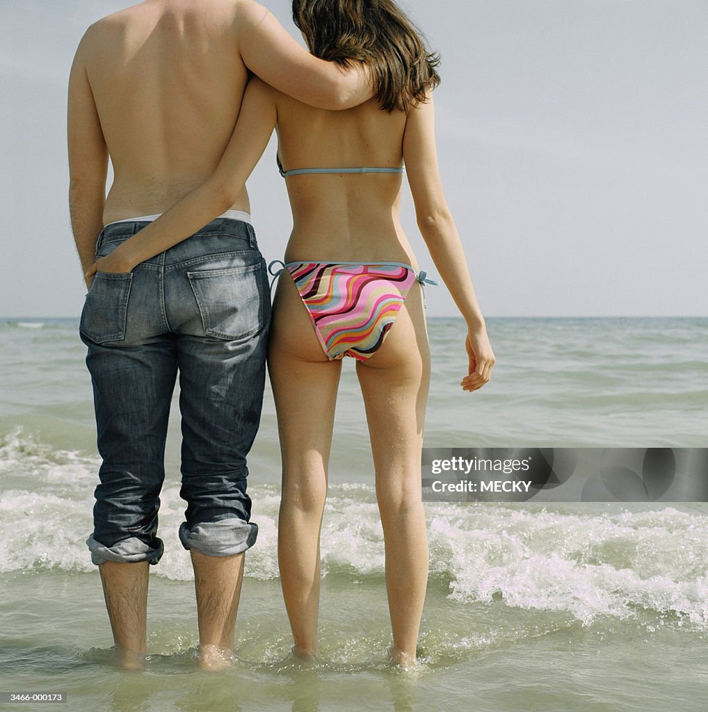 Couple Walking on Beach