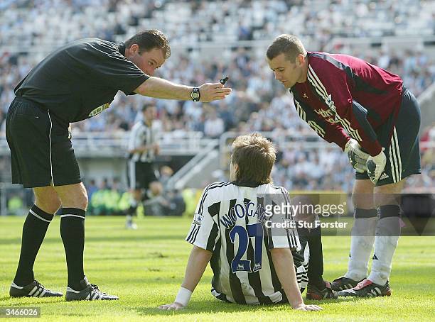 Jonathan Woodgate of Newcastle picks up an injury during the FA Barclaycard Premiership match between Newcastle United and Chelsea at St. James Park...