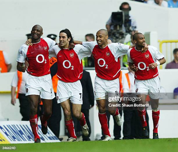 Patrick Vieira, Robert Pires, Thierry Henry and Ashley Cole of Arsenal celebrate after the second goal during the FA Barclaycard Premiership match...