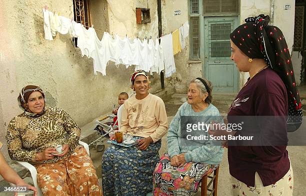 Turkish Cypriots discuss the result of the referendum on the Turkish side of the divided city of Nicosia April 25, 2004 in Nicosia, Cyprus. Greek...