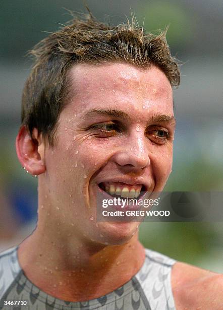 This file photo dated 03 April 2004 shows Craig Stevens smiling after taking second place in the final of the Men's 1500m Freestyle on the final day...