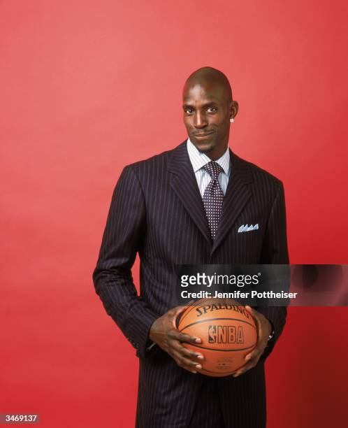 Kevin Garnett of the Minnesota Timberwolves poses for a portrait on December 1, 2003 in Minneapolis, Minnesota. NOTE TO USER: User expressly...