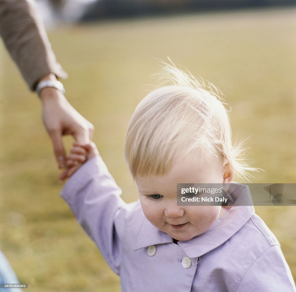 Toddler Holding Mother's Hand