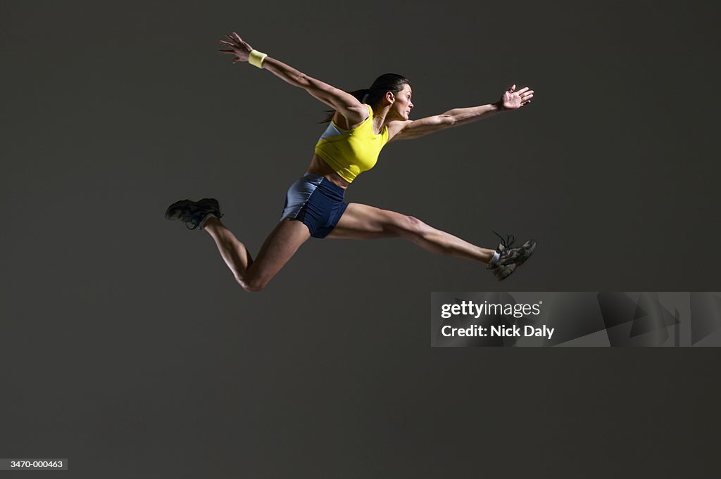 Leaping Example Picture Athlete Leaping High-Res Stock Photo - Getty Images