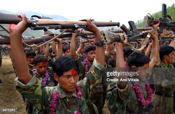 Battalion of Maoist insurgents gather on April 22, 2004 in Rukum district, Nepal weeks after their attack on government troops in Beni when they...