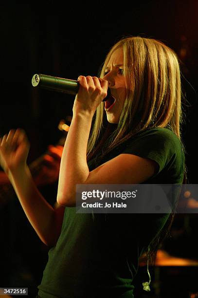 Singer Avril Lavigne performs on stage during her secret fan club gig at the Camden Monarch on April 27, 2004 in London. The 19-year-old Canadian...