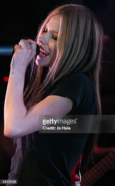 Singer Avril Lavigne performs on stage during her secret fan club gig at the Camden Monarch on April 27, 2004 in London. The 19-year-old Canadian...