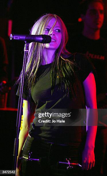 Singer Avril Lavigne performs on stage during her secret fan club gig at the Camden Monarch on April 27, 2004 in London. The 19-year-old Canadian...