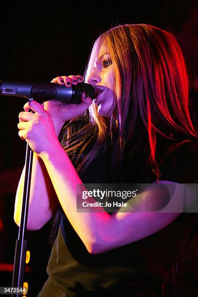 Singer Avril Lavigne performs on stage during her secret fan club gig at the Camden Monarch on April 27, 2004 in London. The 19-year-old Canadian...