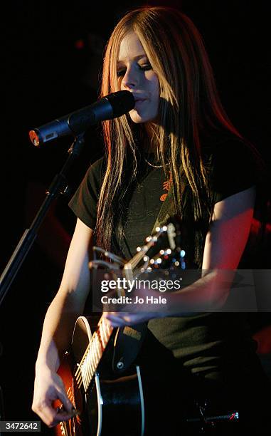 Singer Avril Lavigne performs on stage during her secret fan club gig at the Camden Monarch on April 27, 2004 in London. The 19-year-old Canadian...