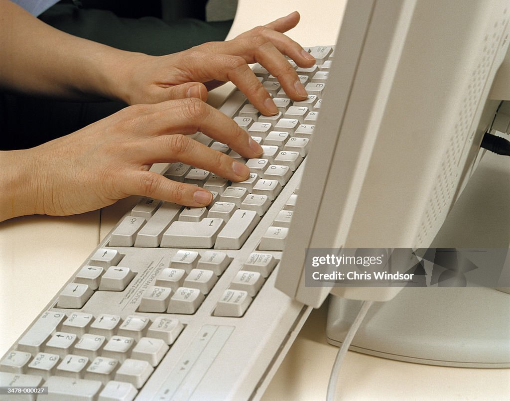 Hands Using Keyboard