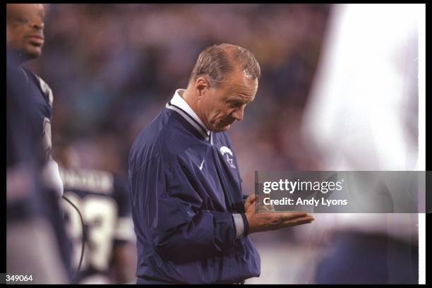 Dallas Cowboys head coach Barry Switzer looks on during a playoff game against the Carolina Panthers at Ericsson Stadium in Charlotte, North...