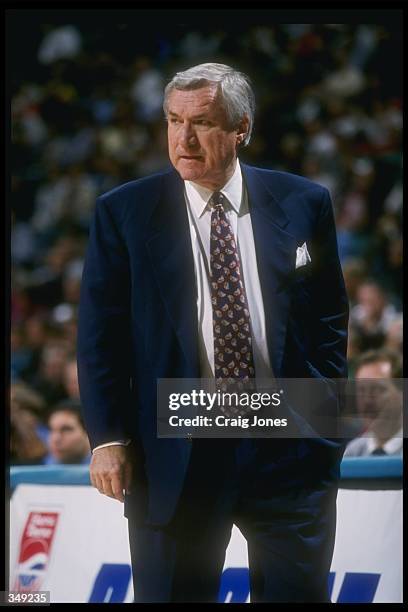 North Carolina Tar Heels head coach Dean Smith looks on during the Pepsi Challenge against the USC Trojans at the Coliseum in Charlotte, North...