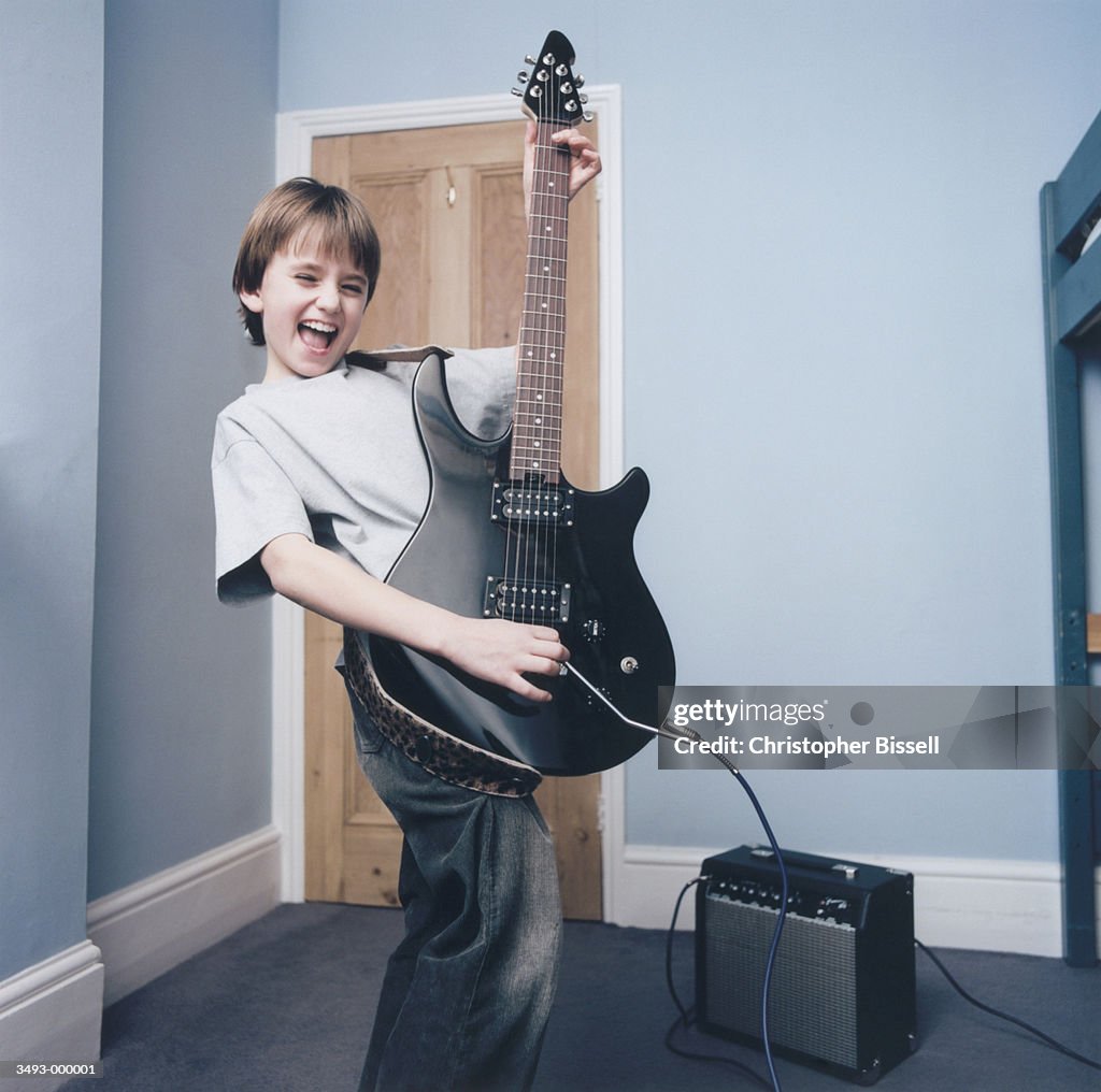Boy Playing Electric Guitar
