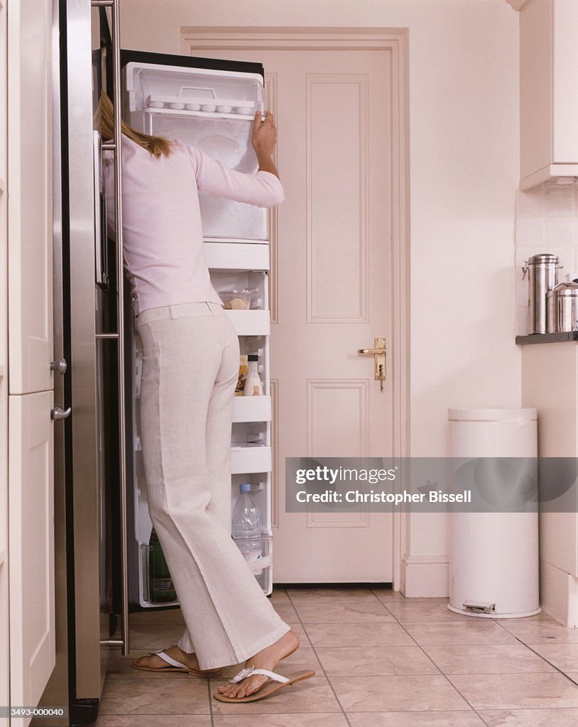 Woman Looking in Fridge