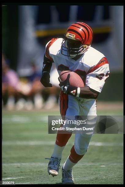 Defensive back Mitchell Price of the Cincinnati Bengals runs with the ball during a game against the San Diego Chargers at Jack Murphy Stadium in San...