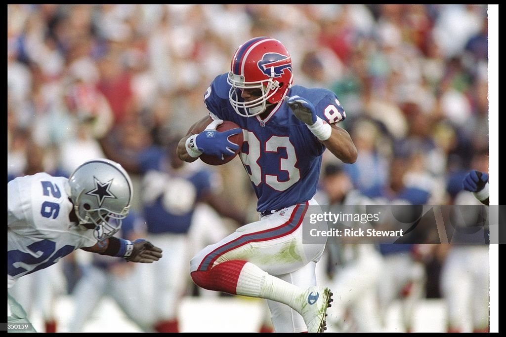 Andrew Reed Nfl Wide receiver Andre Reed of the Buffalo Bills moves the ball during ...