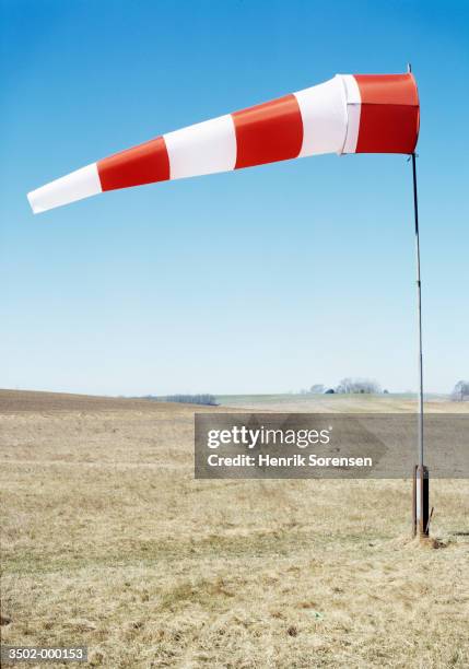 red and white windsock - wind sock stock pictures, royalty-free photos & images