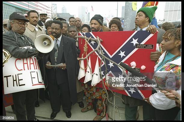 Georgia Senator Ralph Albernathy protests with Jesse Jackson before Super Bowl XXVIII between the Buffalo Bills and the Dallas Cowboys at the Georgia...