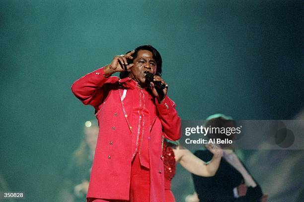 Singer James Brown performs during the half-time show for Super Bowl XXXI between the New England Patriots and the Green Bay Packers at the Superdome...