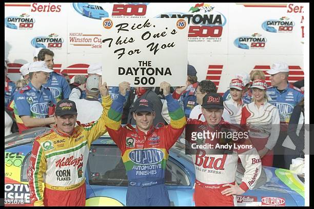 The three drivers of Hendrick Motorsports, Jeff Gordon , Terry Labonte , and Ricky Craven celebrate after finishing 1-2-3 in the NASCAR Daytona 500...