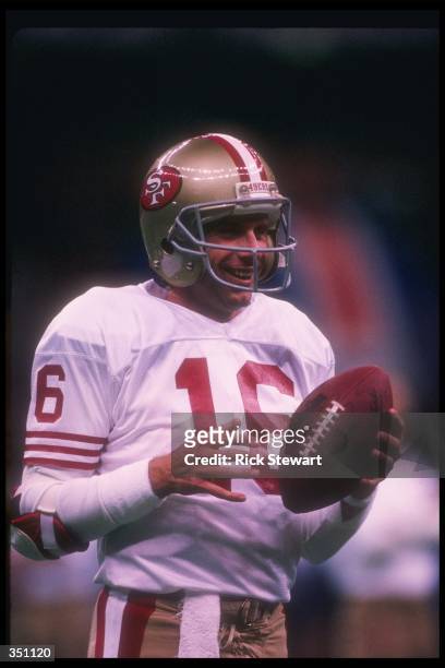 Quarterback Joe Montana of the San Francisco 49ers looks on during Super Bowl XXIV against the Denver Broncos at the Superdome in New Orleans,...