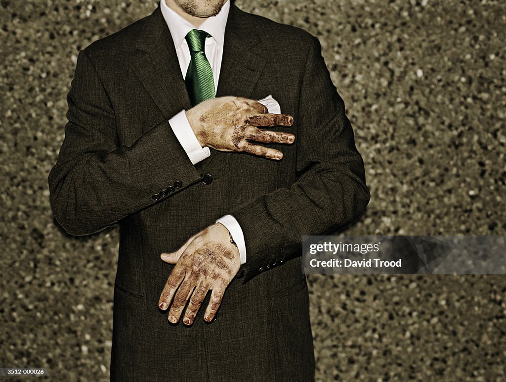 Businessman with Dirty Hands