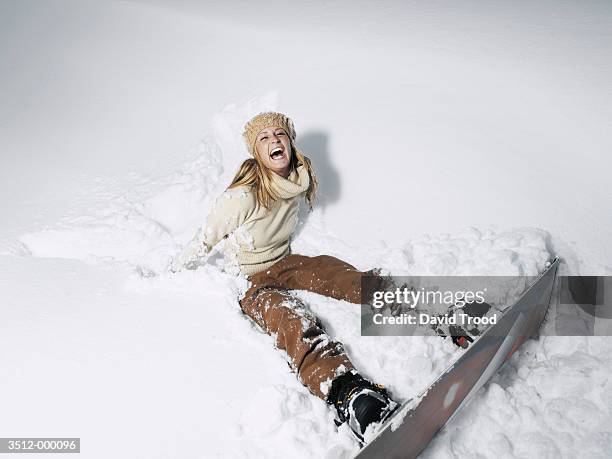 snowboarder - woman snowboarding stock pictures, royalty-free photos & images