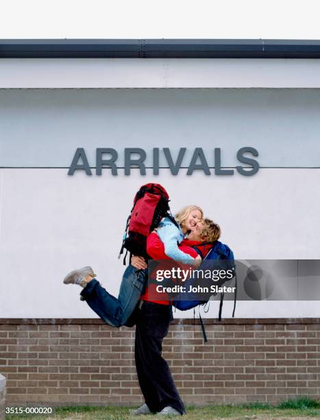 reunited backpackers - port airport stock pictures, royalty-free photos & images