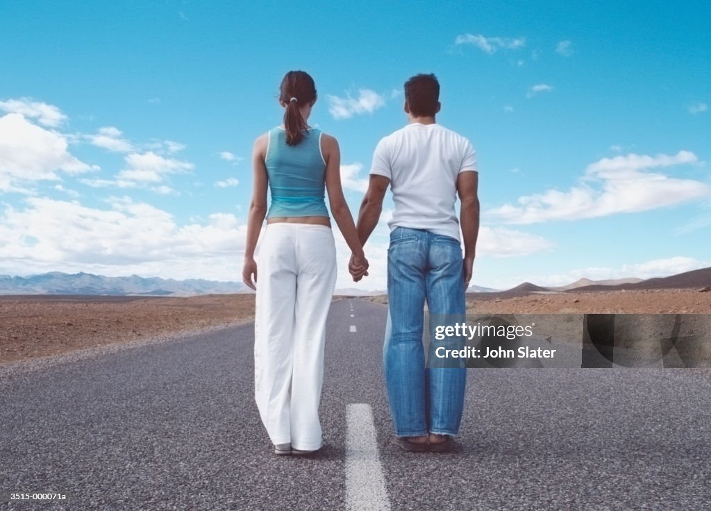 Couple Standing on Road