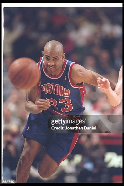 Forward Grant Hill of the Detroit Pistons moves down the court during a game against the Chicago Bulls at the United Center in Chicago, Illinois....