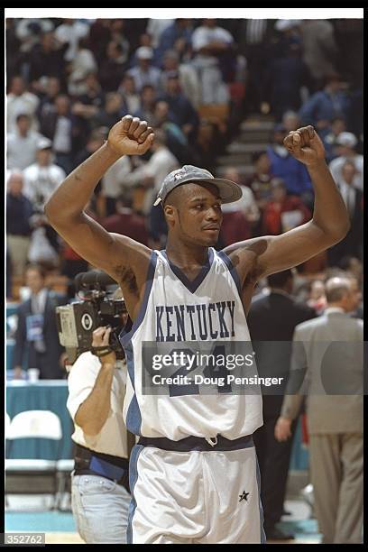 Forward Antoine Walker of the Kentucky Wildcats celebrates during a game against the Syracuse Orangemen at the Meadowlands Arena in East Rutherford,...