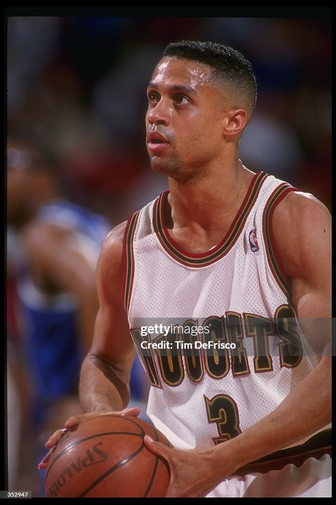 Mahad Rauf Guard Mahmoud Abdul-Rauf of the Denver Nuggets looks to shoot the ...