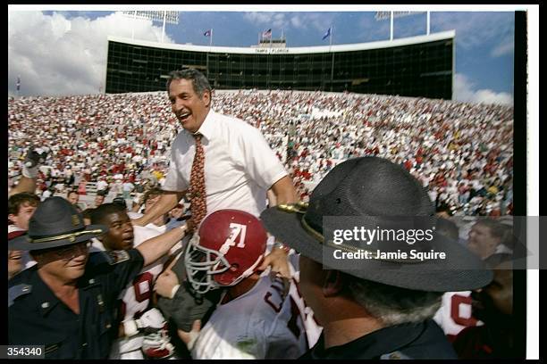 Alabama Crimson Tide head coach Gene Stallings celebrates after the Outback Bowl against the Michigan Wolverines in Tampa, Florida. Alabama won the...