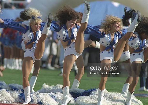 The Dallas Cowboys cheerleaders perform during Super Bowl XXVII against the Buffalo Bills at the Rose Bowl in Pasadena, California. The Cowboys won...