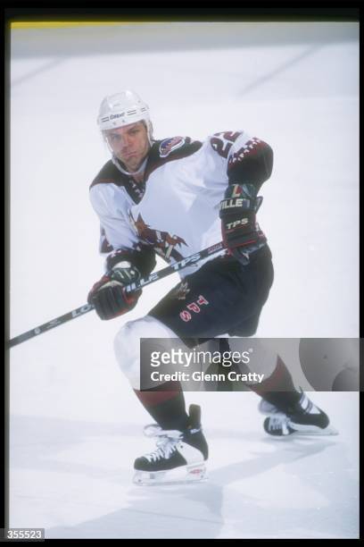 Rightwinger Mike Gartner of the Phoenix Coyotes moves down the ice during a game against the Toronto Maple Leafs at the America West Arena in...