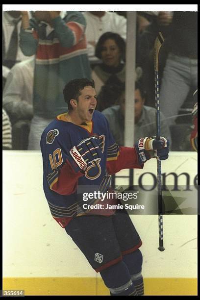 Center Jim Campbell of the St. Louis Blues celebrates during a game against the Phoenix Coyotes at the America West Arena in Phoenix, Arizona. The...