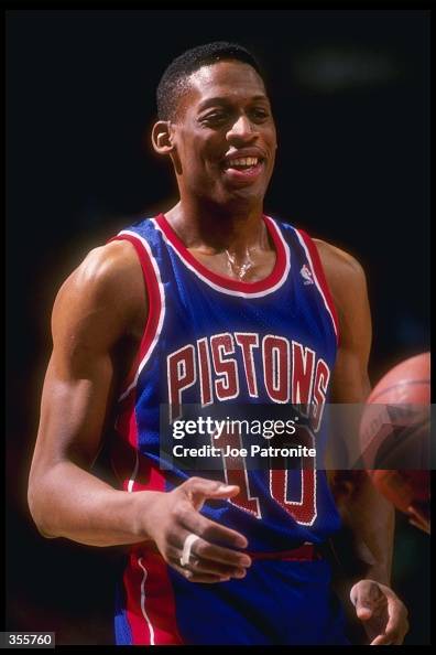 Detroit Rodman Forward Dennis Rodman of the Detroit Pistons looks on during a game ...