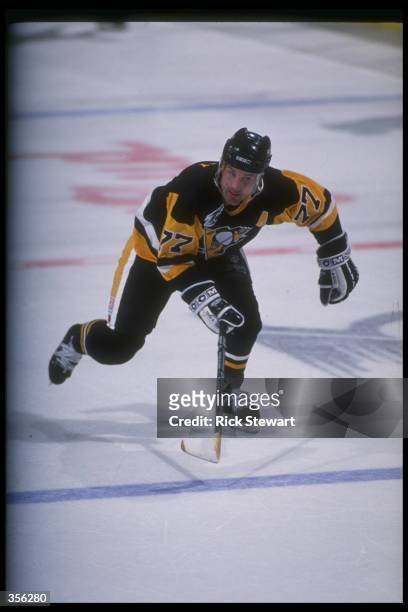 Defenseman Paul Coffey of the Pittsburgh Penguins moves down the ice during a game against the Buffalo Sabres at Memorial Auditorium in Buffalo, New...