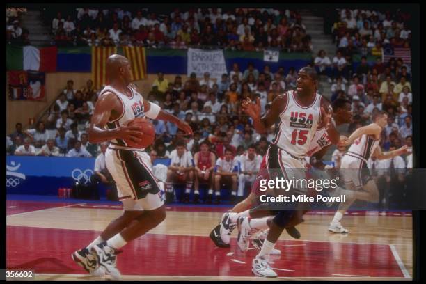 United States forward Charles Barkley and guard Earvin "Magic" Johnson move down the court during a game at the Olympic Games in Barcelona, Spain....